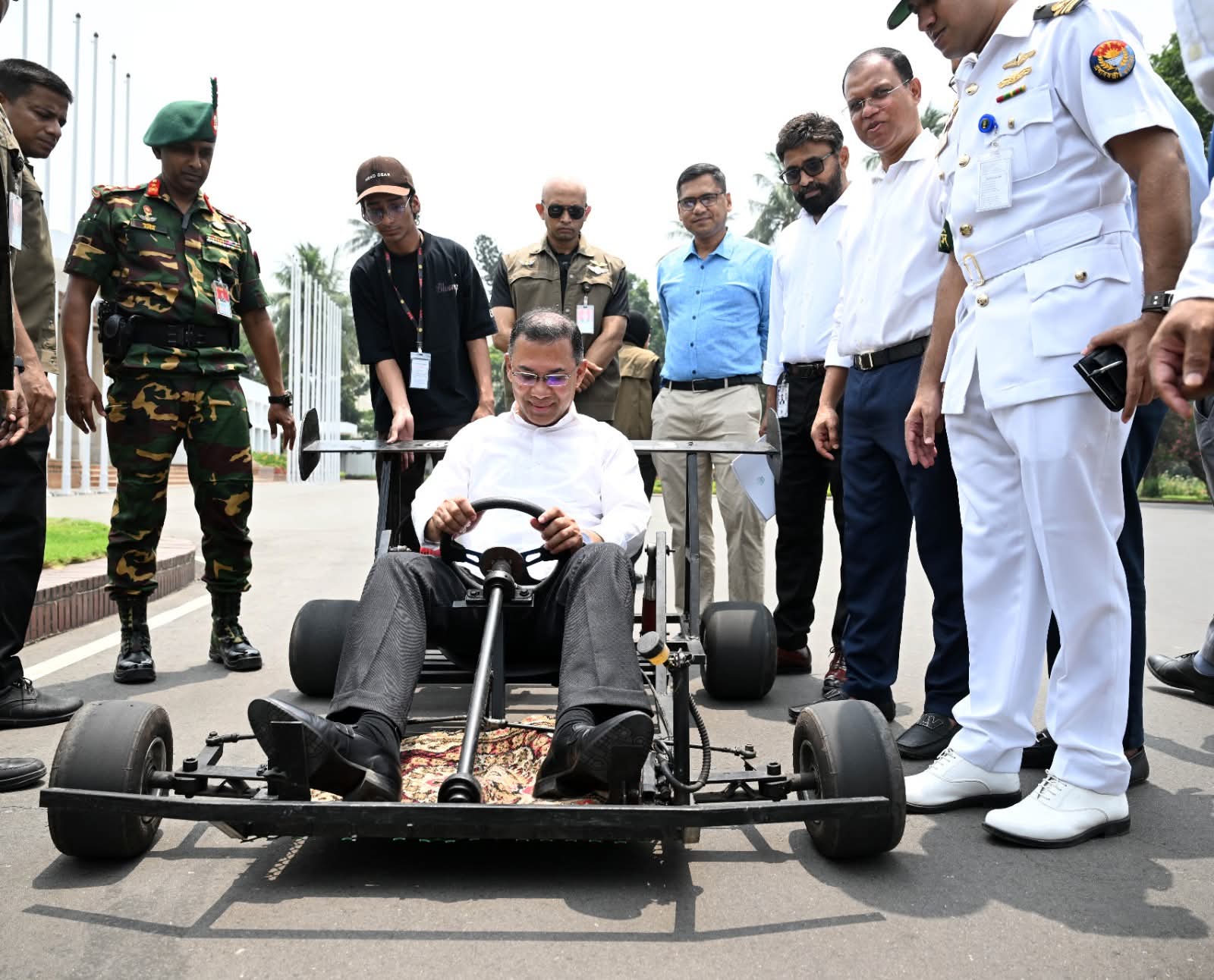 PM Tarique Rahman encourages college student Rizan Rashid by driving his go-kart (racing car)